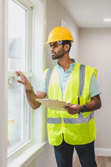 Engineer inspecting the interior of a newly built property